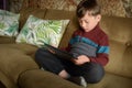 Boy with digital device and gadget Royalty Free Stock Photo