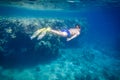 Boy dive in Red sea near coral reef Royalty Free Stock Photo