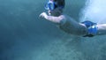 Boy dive in the Red sea with underwater mask