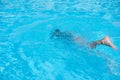 Boy in diving mask swim underwater in the swimming pool Royalty Free Stock Photo