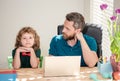 boy do homework with teacher. webinar video lesson. online education on laptop. Royalty Free Stock Photo