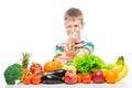 The boy does not like vegetables and fruits, disgust for food concept photo Royalty Free Stock Photo