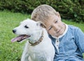 Young boy with dog Royalty Free Stock Photo