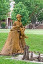 Boy and Dog Fishing Sculpture at Theta Pond