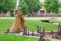 Boy and Dog Fishing Sculpture at Theta Pond