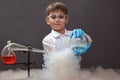 Boy doing experiments in the laboratory. Experiments with liquid nitrogen. Science and education. Royalty Free Stock Photo