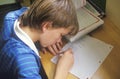 A boy doing his homework