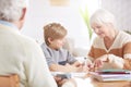 Boy doing homework with grandma Royalty Free Stock Photo