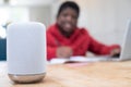 Boy Doing Homework At Home Asking Digital Assistant Question Royalty Free Stock Photo