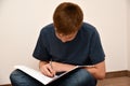 Boy doing maths homework Royalty Free Stock Photo