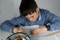 Boy doing maths homework Royalty Free Stock Photo
