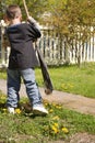 Boy doing yardwork