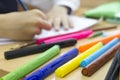 A boy is drawing with a marker Royalty Free Stock Photo