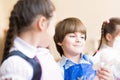 Boy draws in class with other children Royalty Free Stock Photo