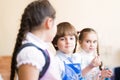 Boy draws in class with other children Royalty Free Stock Photo