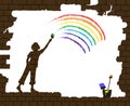 Boy draws a rainbow on the old broken brick wall, life after war, new life after disaster idea, graffiti,