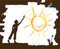 Boy draws a sun by paint brash on the old broken brick wall, protect homeless children concept, new life after disaster Royalty Free Stock Photo