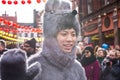 Boy dressed with a furry mouse costume waving his hand