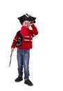 Boy dressed like pirate watching in spyglass