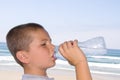 Boy drinking bottled water Royalty Free Stock Photo