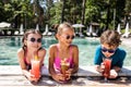 Boy in drinking fresh fruit cocktail