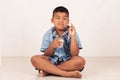 Boy drinking milk and concede Royalty Free Stock Photo