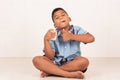 Boy drinking milk and concede Royalty Free Stock Photo