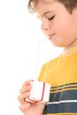 Boy drinks from gift through tubule