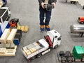 Boy drives truck model with control panel Royalty Free Stock Photo