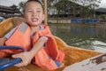 Boy driving boat Royalty Free Stock Photo