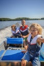 Boy driving boat