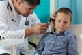 Boy during ear examination Royalty Free Stock Photo