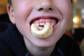 Boy Eating Battered Squid Rings Royalty Free Stock Photo
