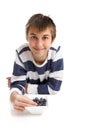 Boy eating blueberries