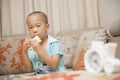 Boy eating bread