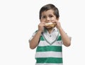 Boy eating bread Royalty Free Stock Photo