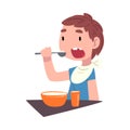 Boy Eating Breakfast at the Table, Cute Child Daily Routine Activity Cartoon Style Vector Illustration on White