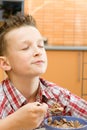 Boy eating cereal