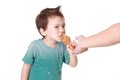 Boy eating chicken