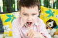 Boy eating chocolate lava cake happily Royalty Free Stock Photo