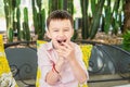 Boy eating chocolate lava cake happily Royalty Free Stock Photo