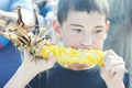 Boy Eating Corn Royalty Free Stock Photo