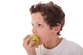 Boy eating a green apple Royalty Free Stock Photo