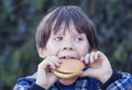 Boy eating a hamburger