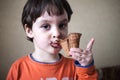 The boy is eating ice cream. Royalty Free Stock Photo