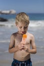 Boy eating an ice lolly