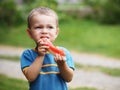 Boy eating melon Royalty Free Stock Photo