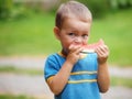 Boy eating melon Royalty Free Stock Photo