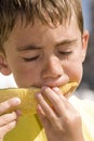 Boy eating melon