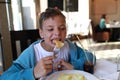 Boy eating nuggets with mashed potatoes Royalty Free Stock Photo